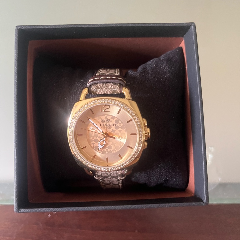 Coach gold Watch